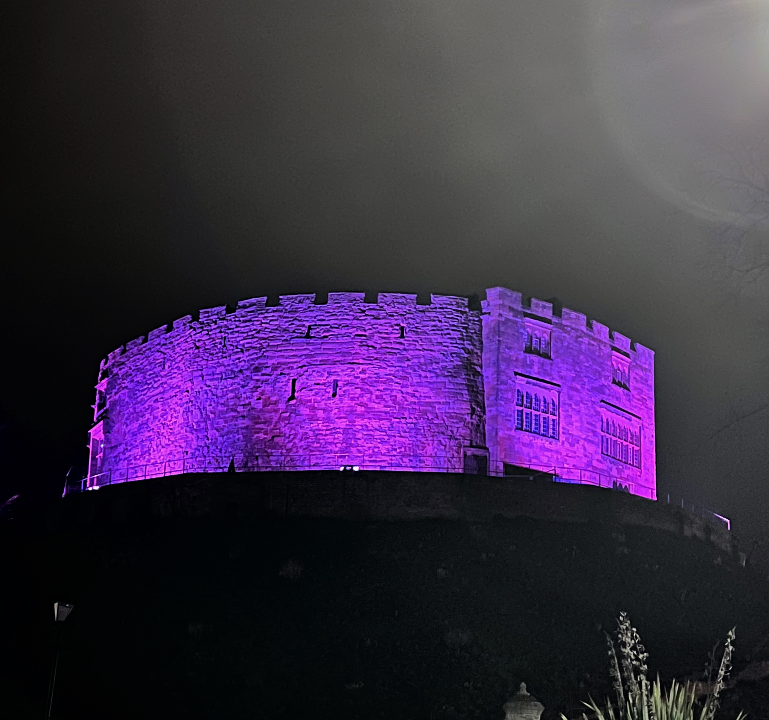 Tamworth Castle in the dark lit up purple