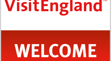 graphic of the VisitEngland logo of a red rosette and a white background 